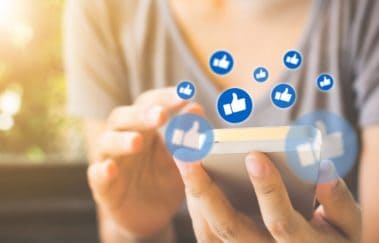 woman liking posts on social media