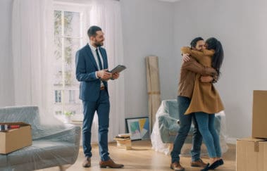 Real estate broker who's just helped a young couple find their dream home