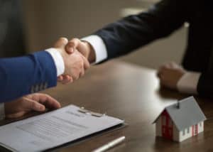 North Carolina broker using real estate negotiation strategies to close a deal
