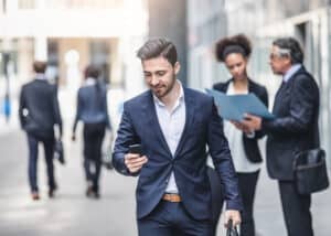 Commercial real estate broker walking to a business meeting downtown