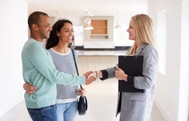 North Carolina real estate broker showing a home to a young couple