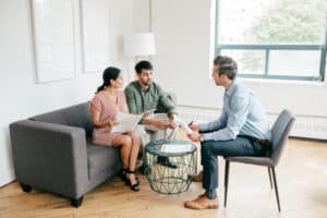 North Carolina real estate broker meeting with a young couple