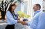 Real estate broker greeting an appraiser with a handshake to promote a positive appraiser-broker relationship