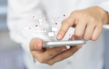 close up woman hand touchscreen on smartphone's display, social media marketing concept