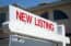 Sign showing new listing
