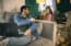 stay at home dad interacts with child